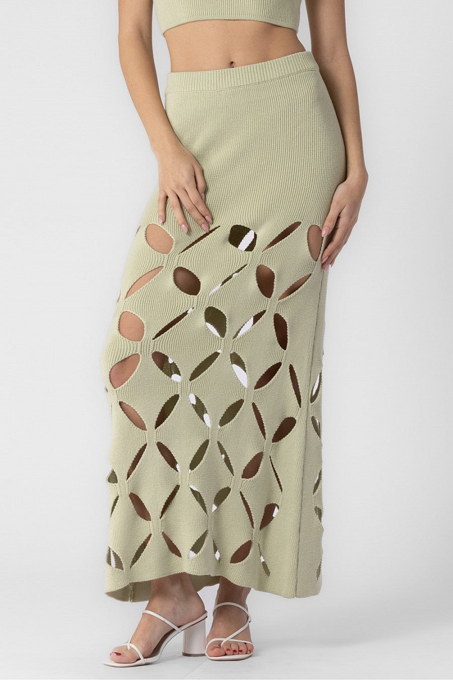 Midi skirt with cut outs in the color sage.