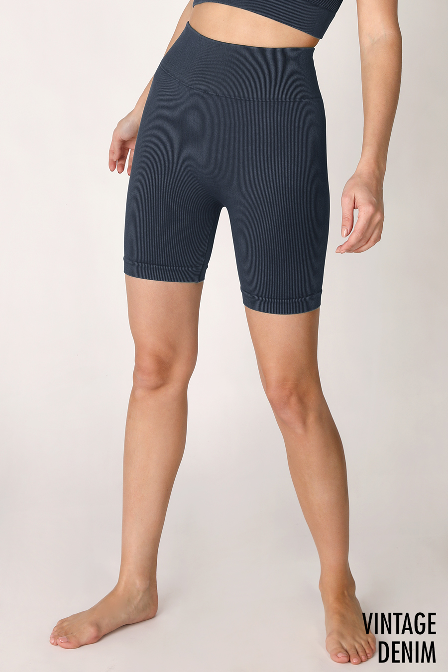 Seamless high waisted biker shorts in the color denim.