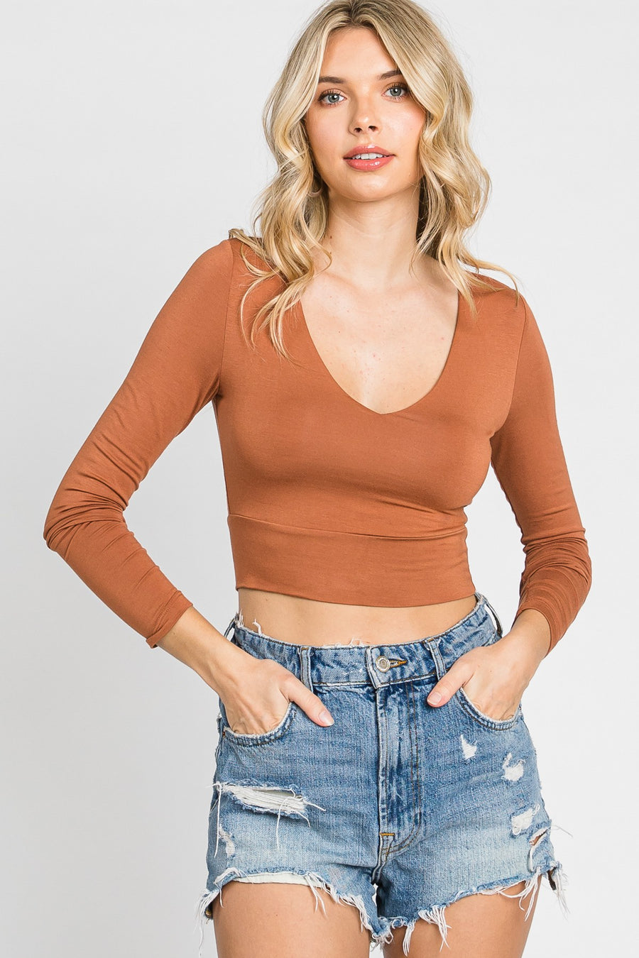 Double layered long sleeve cropped shirt in the color leather brown.