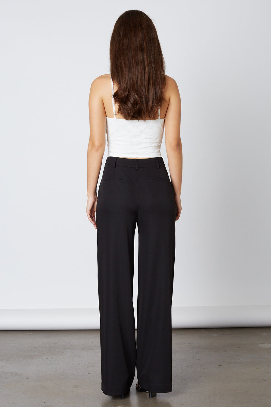 High waisted leg trouser pants in the color Black.