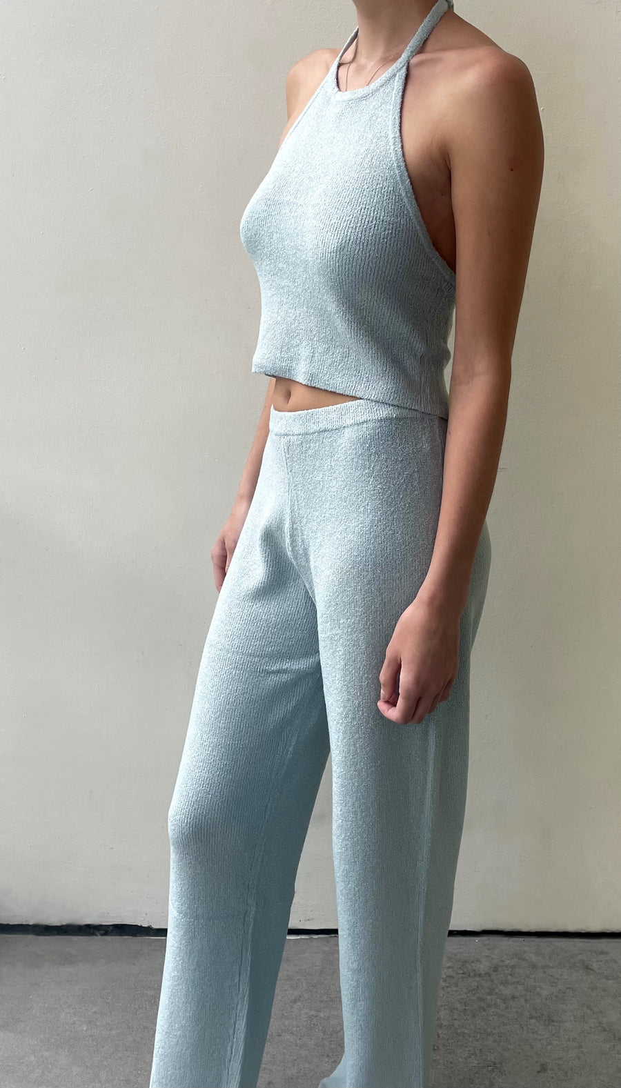 Featuring a loose fit knitted lounge pant in the color blue 