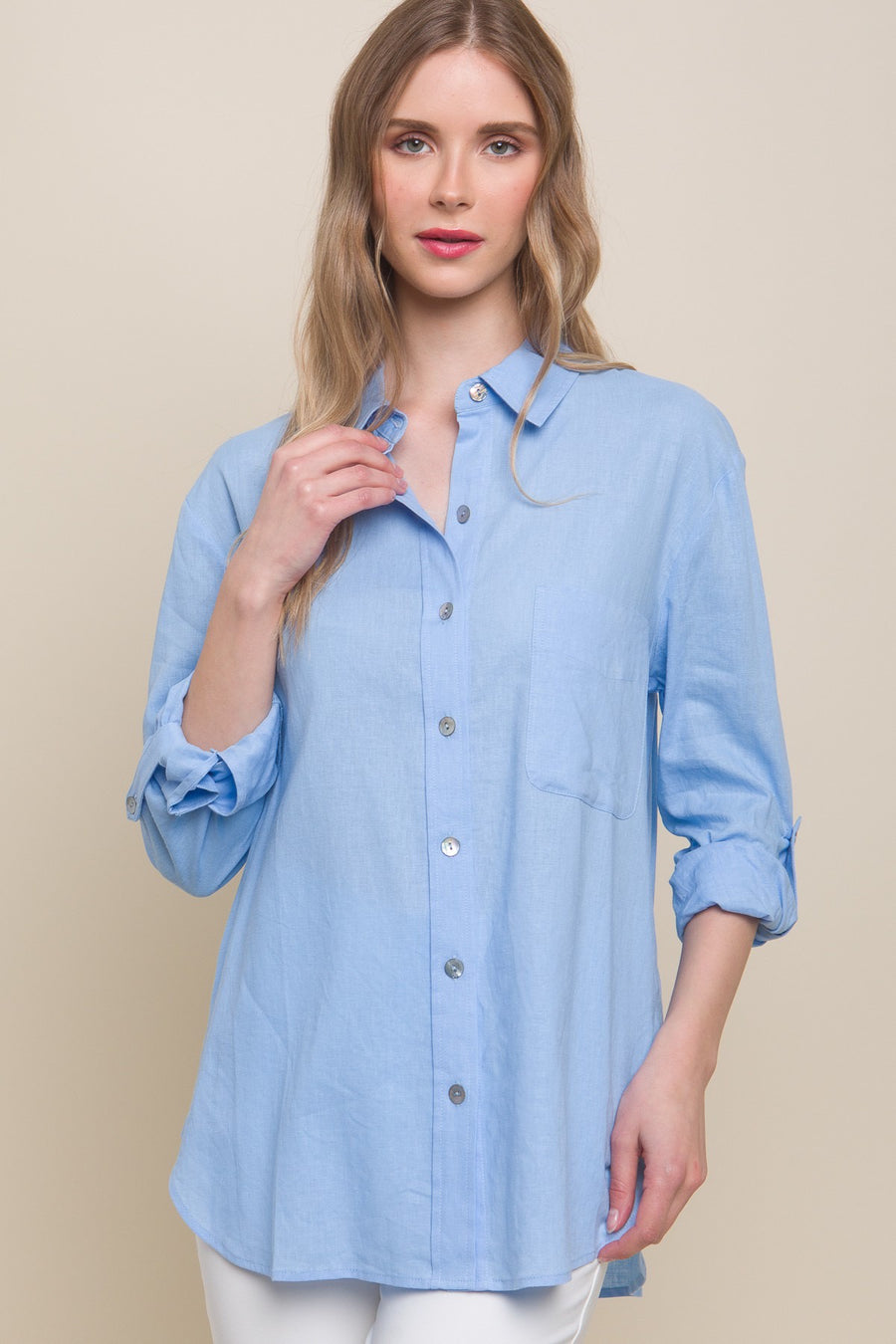 Long sleeve linen buttoned down shirt in the color light blue.