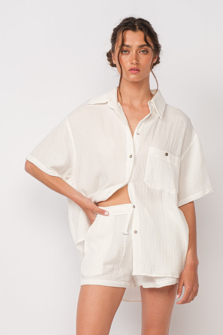 white short sleeve shirt with collar.
