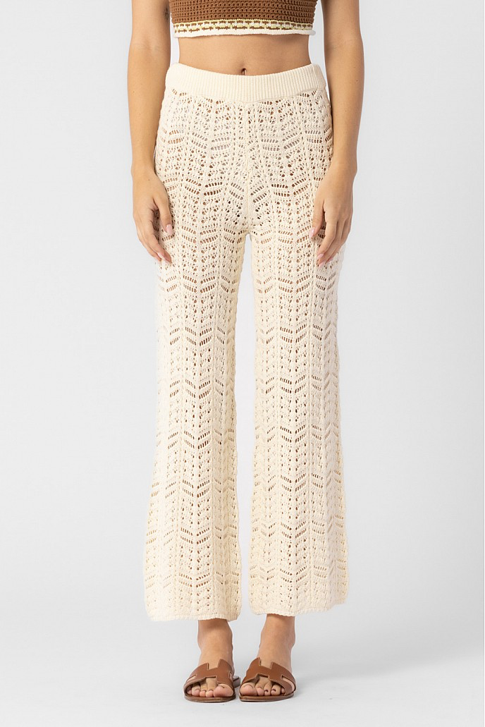 Cream crochet pants.
