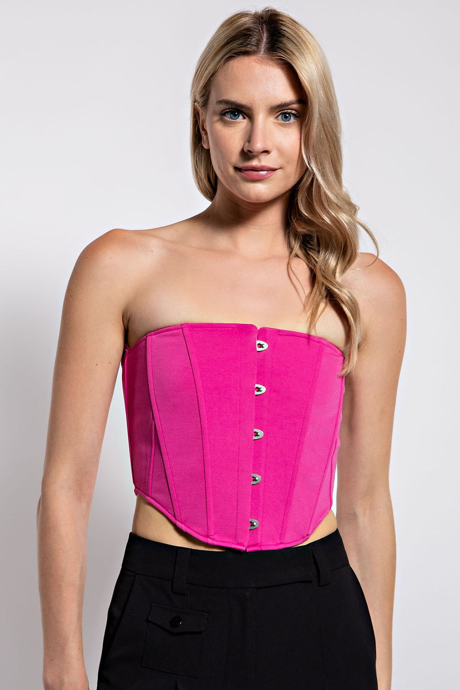 strapless corset top in the color hot pink.