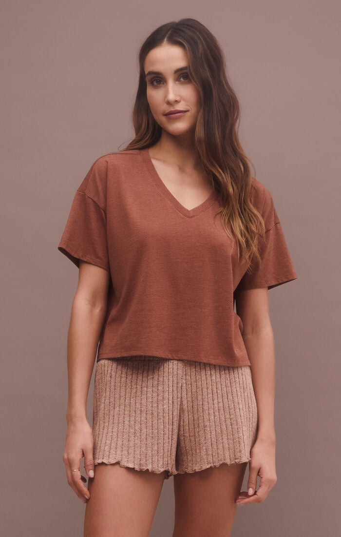 Short sleeve cropped top in the color maple syrup.