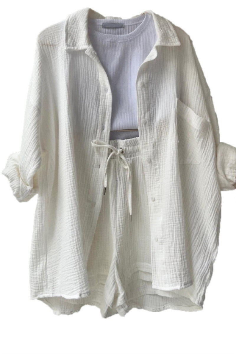 White long sleeve button down top.
