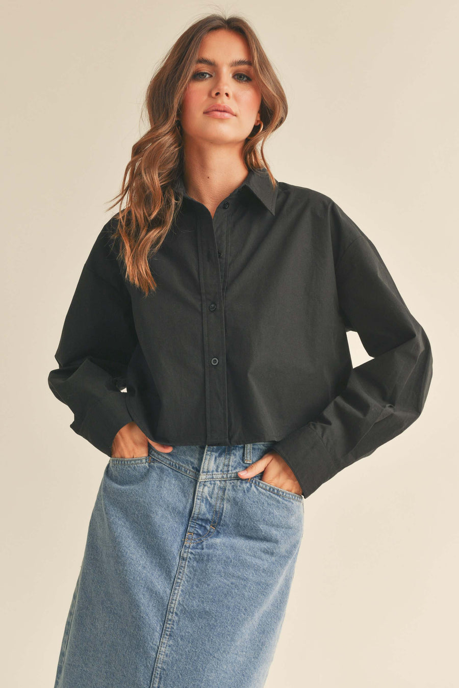 Cropped long sleeve button down shirt.