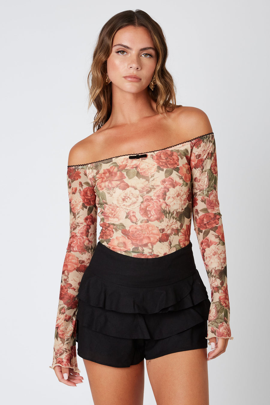 Amber off the shoulder long sleeve top with floral print. 
