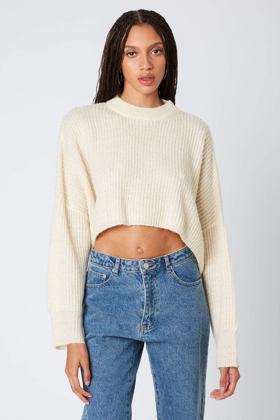 Ivory cropped round neck sweater. 