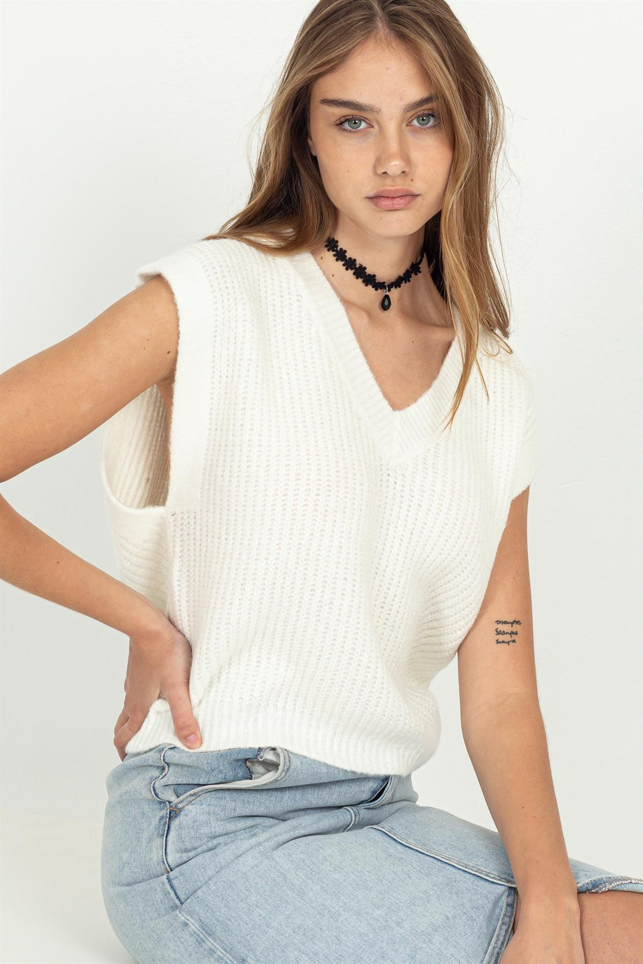 Oversized knitted vest in the color off white. 