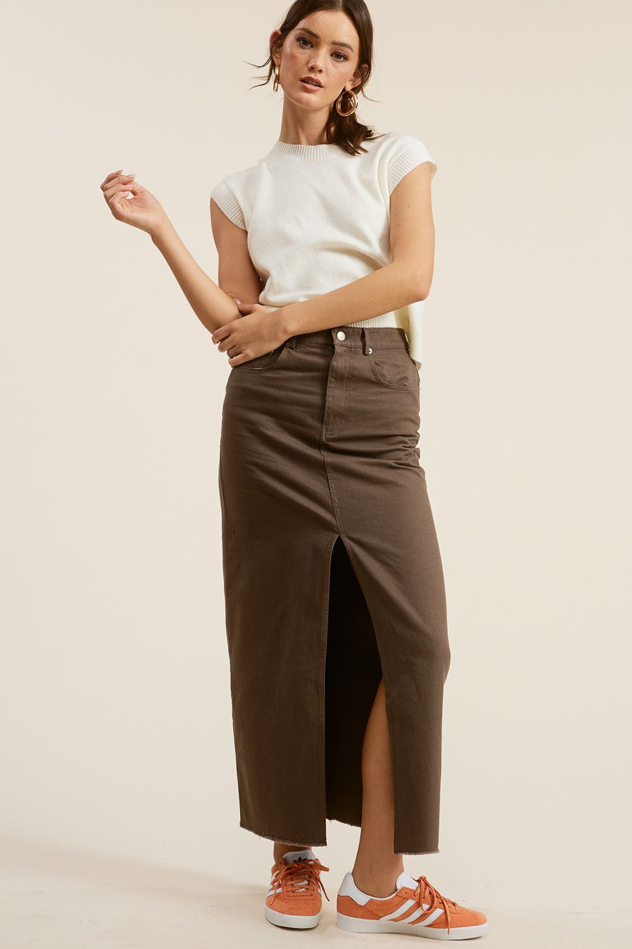 Chestnut denim skirt with front slit. 