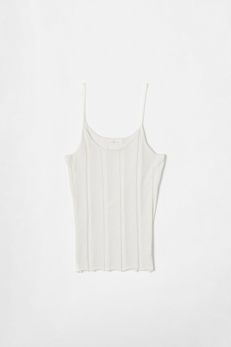 Featuring a ribbed tank top with a scoop neck and spaghetti straps.