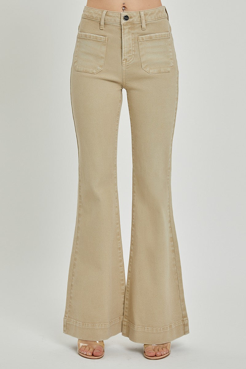 Featuring a high rise denim pant with a bell bottom flare and front patch pockets.