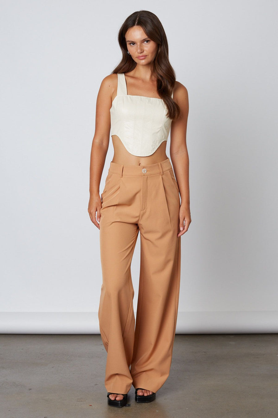High waisted leg trouser pants in the color tan.
