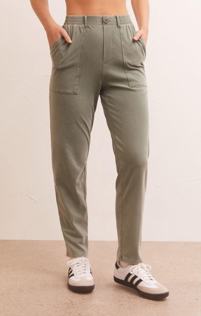 Soft knit cotton pant with large front pockets and button/zipper closure.